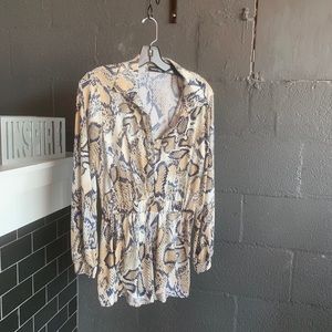 Snake print romper Available in different sizes